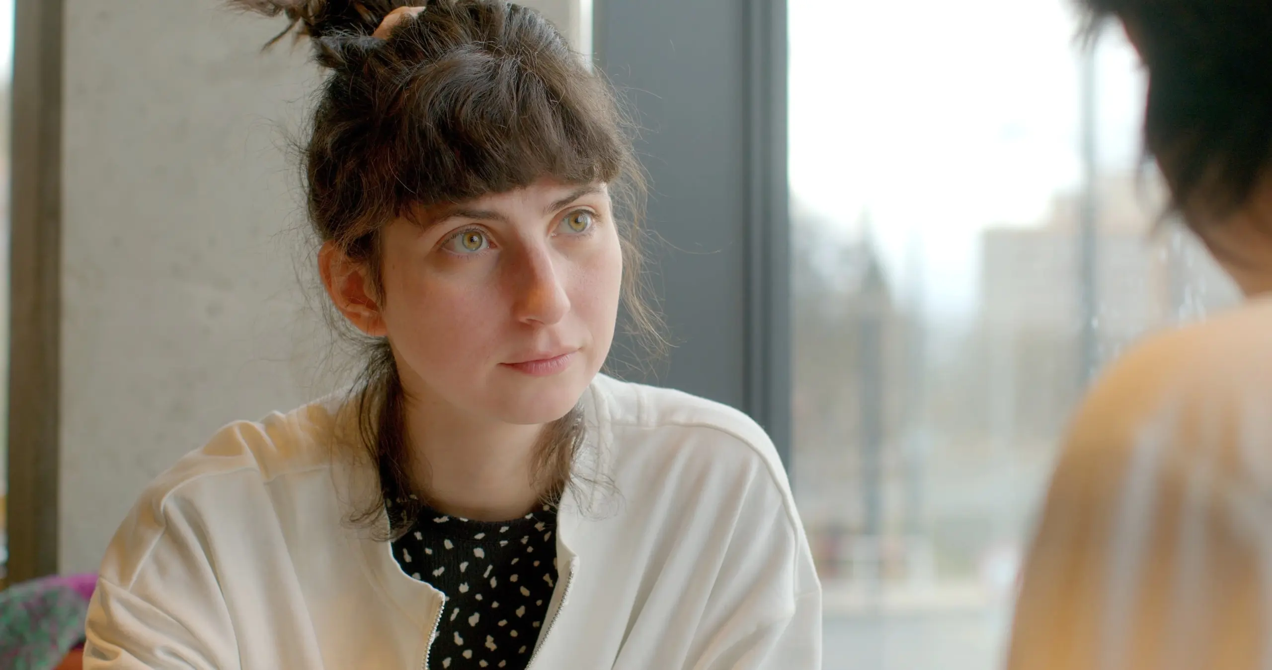 individual watching a loved one with concern over possible addiction