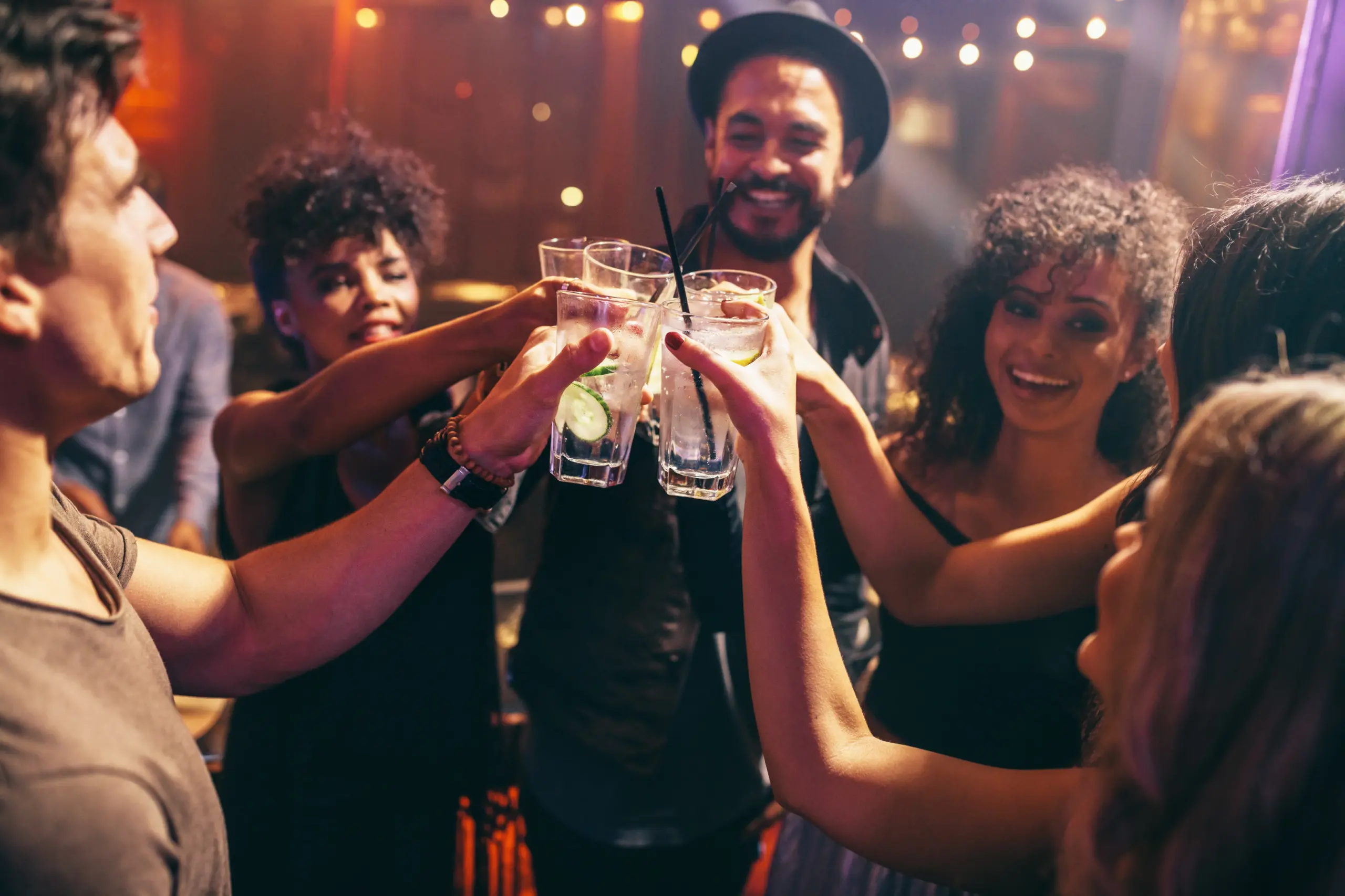 college students at a party drinking alcohol, illustrating campus substance use culture