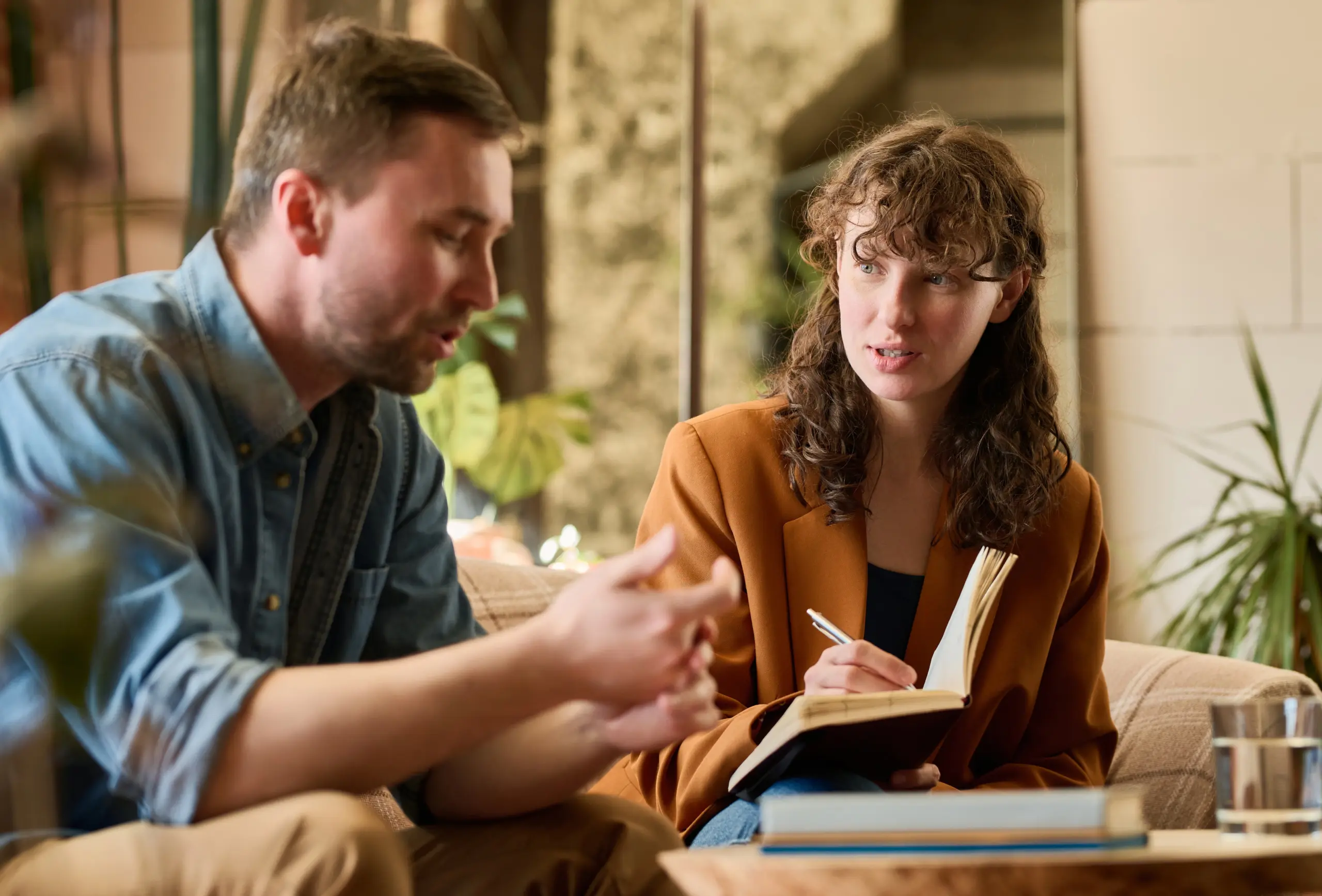 Therapist and client using positive language in cognitive behavioral therapy