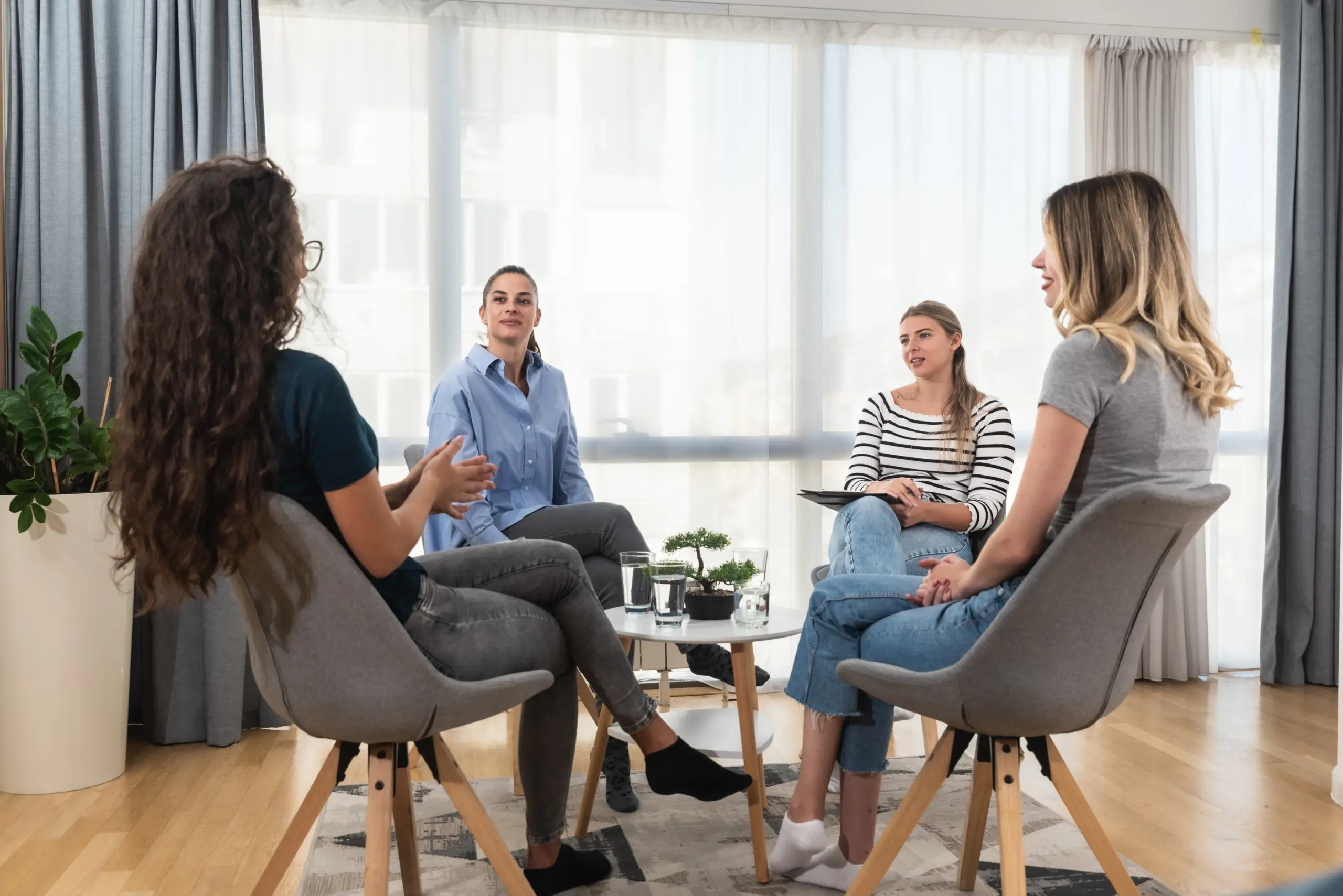Support group sharing stories and healing through spoken words