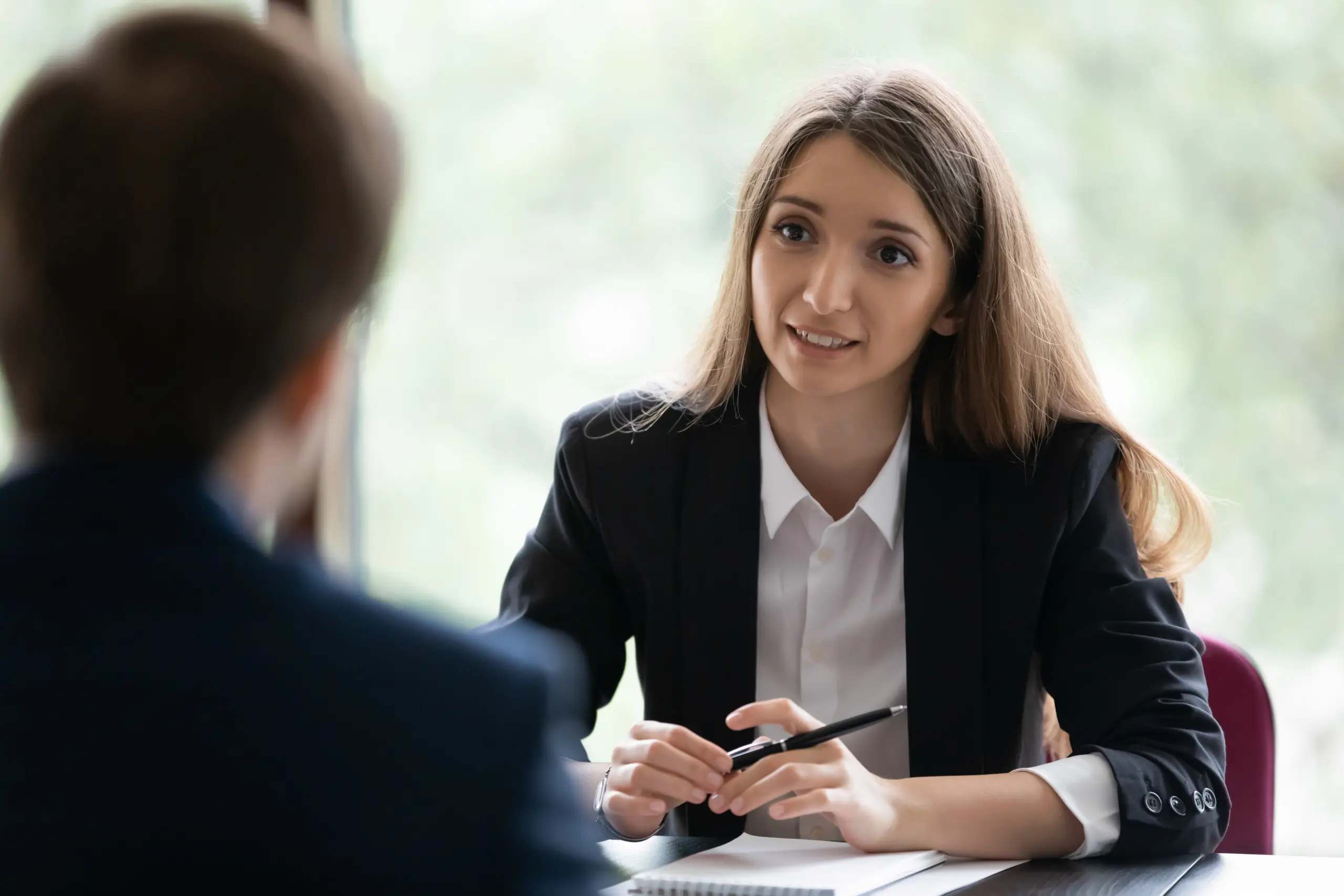 Confidential HR meeting discussing employee assistance program for recovery support