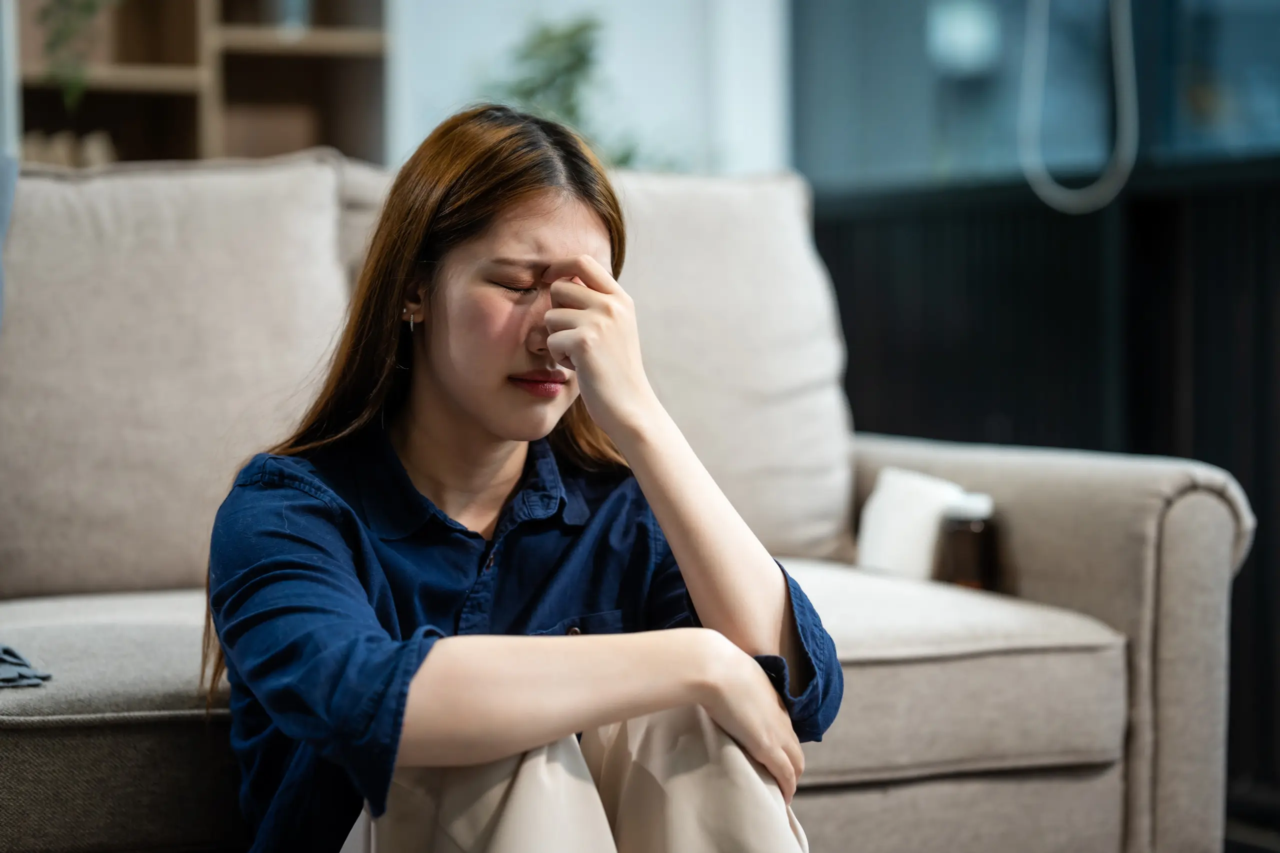 Illustration showing a stressed individual overwhelmed by pills and addiction symbols, signaling the emotional link between stress and substance use