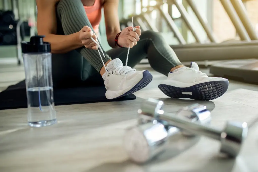 Woman exercising in a gym.