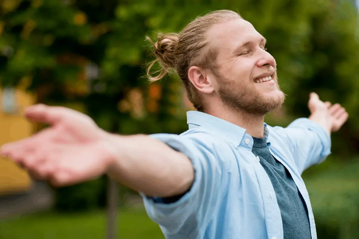 Man living a happy and healthy life after rehab