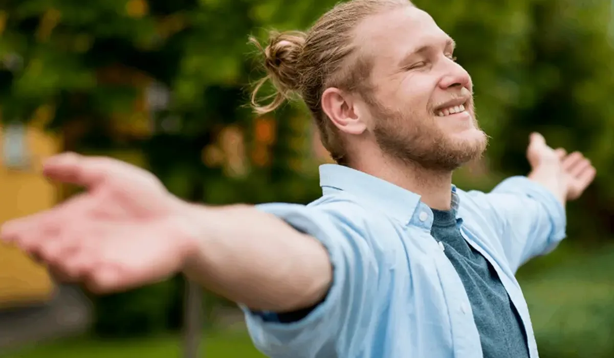 Man living a happy and healthy life after rehab