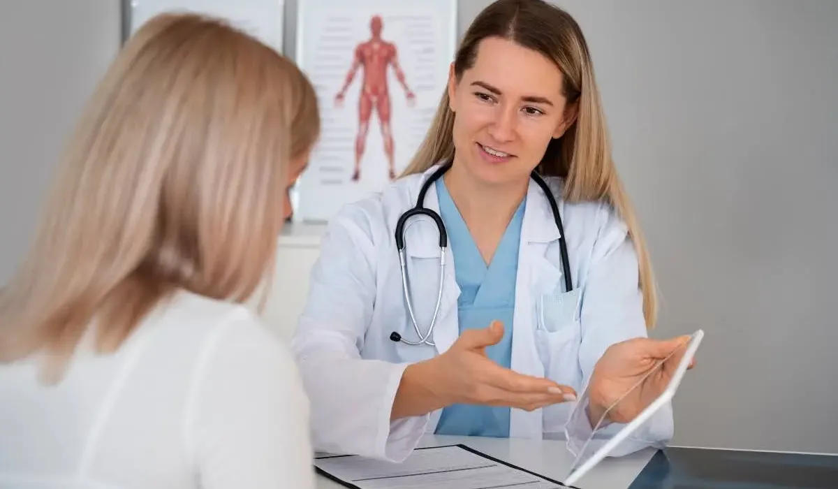 Medical professional explaining to a patient how exercise can help overcome addiction.